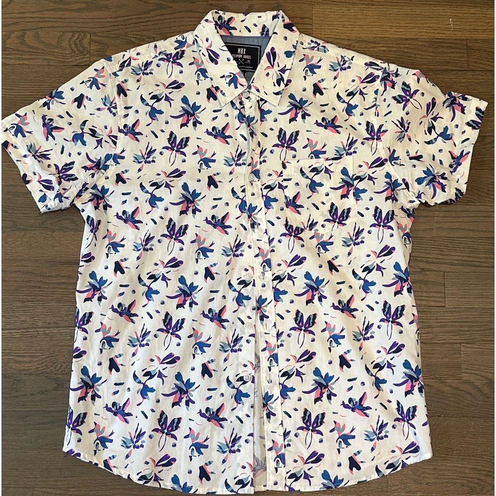Short sleeve button up shirt. White with pink and blue tropical pattern